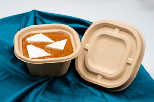 delivery container holding shahi paneer