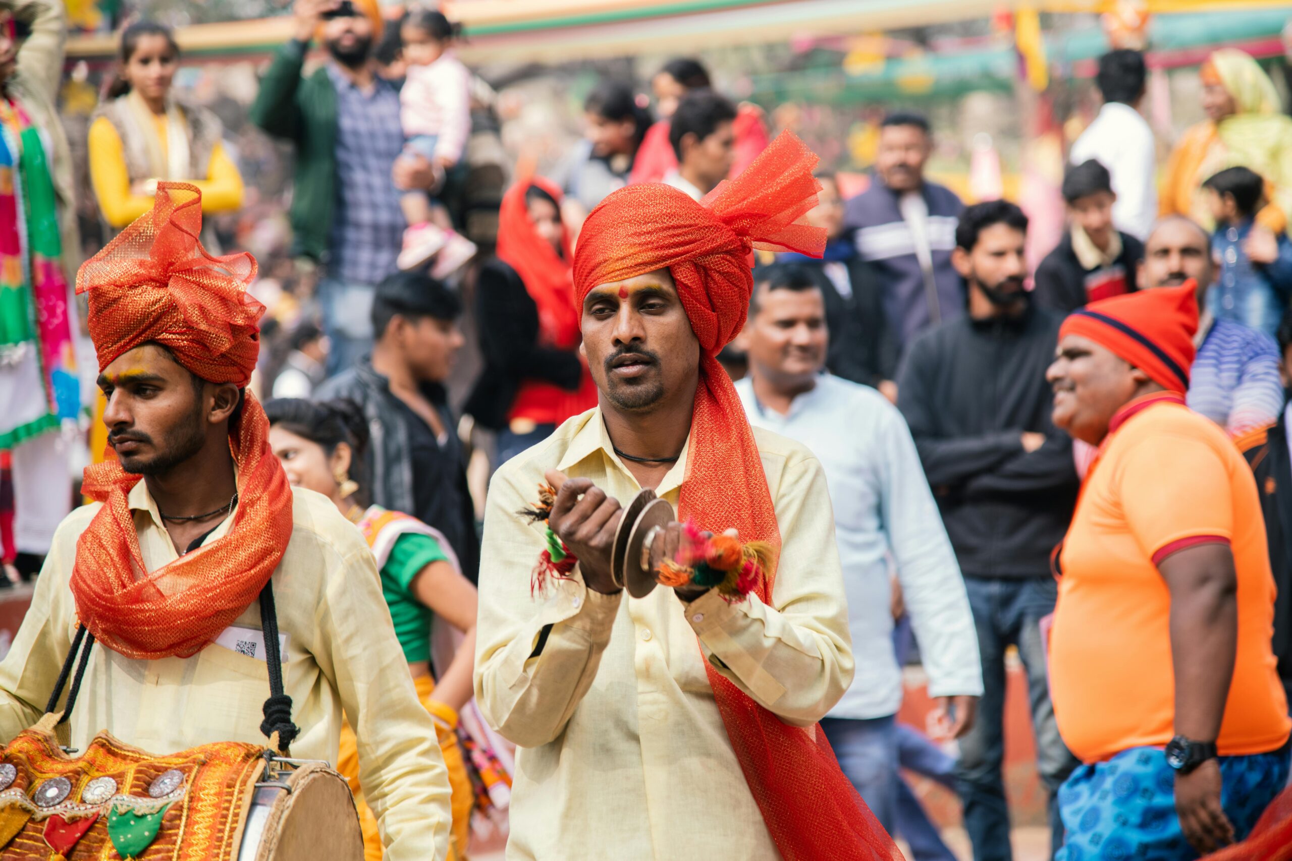 Traditional Indian street festival musicians in colorful attire