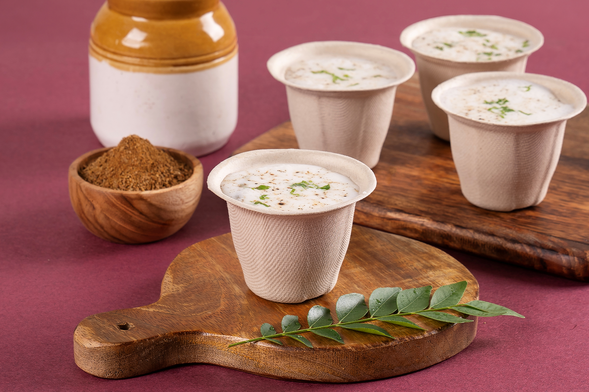 Chuk compostable bagasse cups serving masala chaas spiced buttermilk