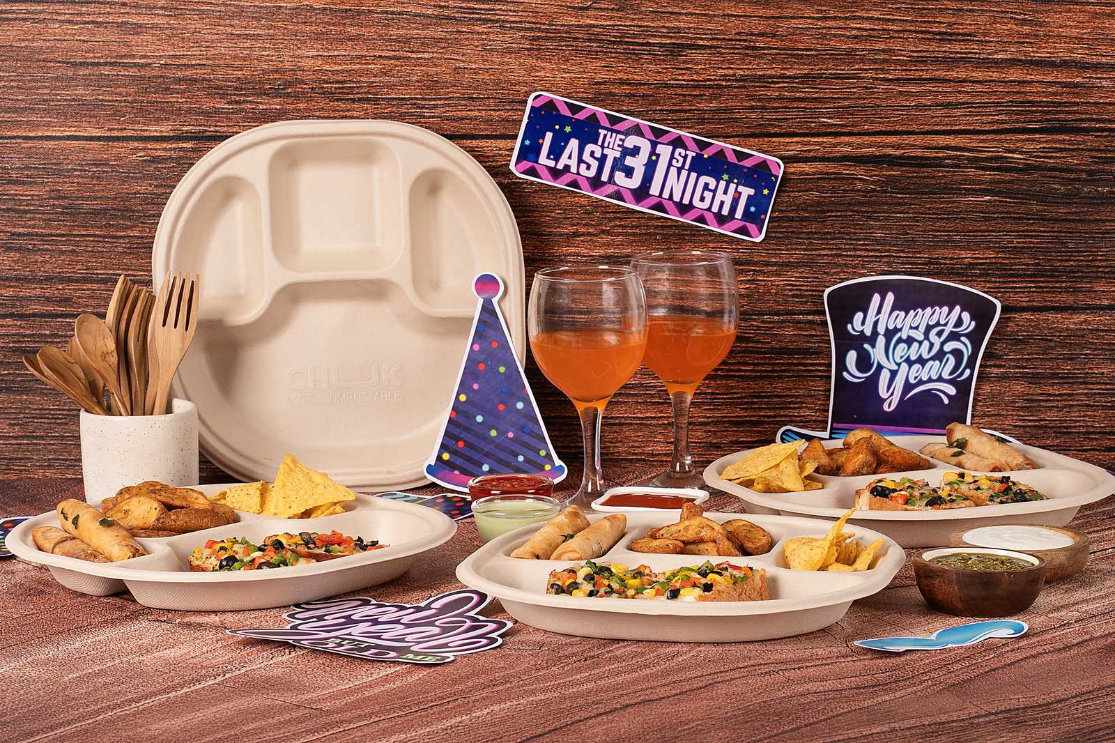 Four-compartment compostable bagasse meal plate, product view showing separated sections for a sadya spread